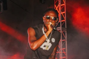 Masicka Tore Down The National Stadium in Nassau, Bahamas The National Stadium in Nassau, Bahamas, was the epicenter of Caribbean entertainment on Saturday, October 18, 2025, as Jamaican Dancehall star Masicka delivered a spectacular live performance. Presented by Big Ten Entertainment, Caribbean Corporate Events, and MCM Promotions, the event, which ran well into the early hours of October 19th, was a massive success for the promoters and fans of "The Genahsyde Boss." An Electric Atmosphere The gates opened at 8:00 PM, welcoming an eager crowd. By the time the show officially started at 10:00 PM, the stadium was pulsing with energy. The visuals and stage production, expertly powered by Fresh Entertainment, were dynamic and intense. Masicka took to the stage, looking every bit the star he is, draped in heavy chains and jewelry, delivering hit after hit to a roaring crowd. The concert lighting was vivid, bathing the stage in dramatic shades of red and pink, creating a powerful backdrop for Masicka's high-energy set. He connected with the audience, showcasing his signature flow and stage presence, keeping the energy high throughout the night.